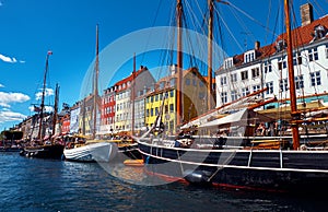 Beautiful cityscape with canal, ships and old buildings. Nyhavn in Copenhagen