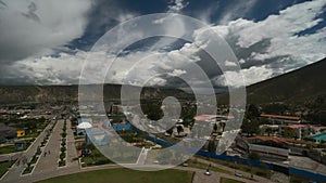 Beautiful cityscape with dramatic amazing cloud sky and urban everyday life at summer day timelapse