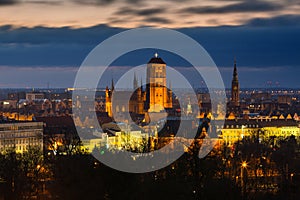 Beautiful cityscape of Gdansk with St. Mary Basilica and City Hall at dawn, Poland