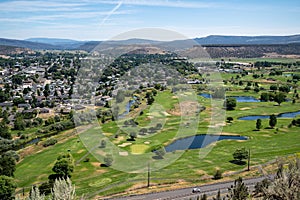 Beautiful cityscape and golf course aerial overlook of Prineville from Ochoco State Scenic Viewpoint in rural Central Oregon