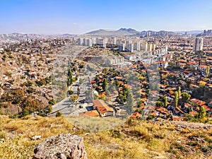 Beautiful cityscape with old and new districts of Ankara, Turkey. Ruins of old houses, ancient huts with red tiled roofs and