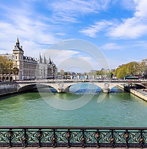 Beautiful cityscape of Paris and Saint-Michel bridge across Seine river. France. April 2019