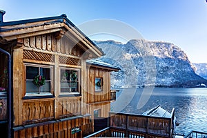 beautiful cityscape of the special city Hallstatt in Austria Salzkammergut snowy winter mountains and lake and wooden