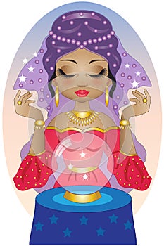 Beautiful clairvoyant reads the future in the crystal ball