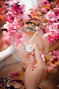 Beautiful classic white watch on woman hand