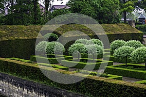 Beautiful classical gardens embrace the commandery Alden Biezen in Bilzen, Belgium.