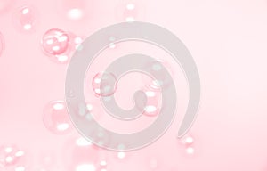 Beautiful clear pink soap bubbles float in the air. Bubbles abstract background