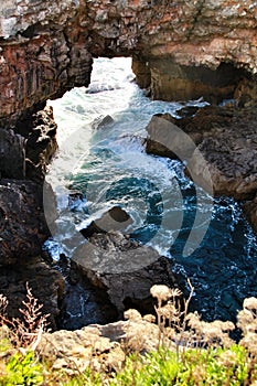 Cliff formation in Cascais called The Boca do Inferno photo