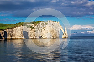 Beautiful cliffs Aval of Etretat, rocks and natural arch landmark of famous coastline, sea landscape, Normandy, France, Europe