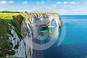 Beautiful cliffs Aval of Etretat, rocks and natural arch landmark of famous coastline, sea landscape, Normandy, France, Europe