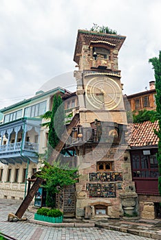 Beautiful Clock Tower of puppet theater Rezo Gabriadze in historical center of old Tbilisi photo