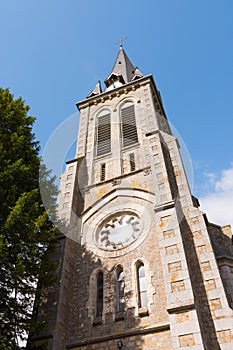 Beautiful close up of Notre-Dame-de-l`Assomption church tower La Lande Patry, Normandy, France