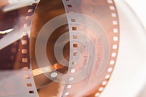 A beautiful closeup of an analogue photo film on a white background.