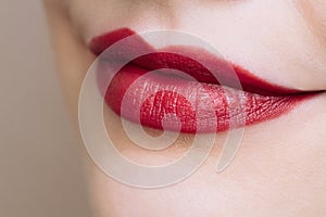 Beautiful closeup female plump lips with bright color makeup