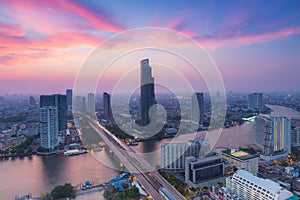 Beautiful cloud background, Modern Business Building along the river curve in Bangkok city