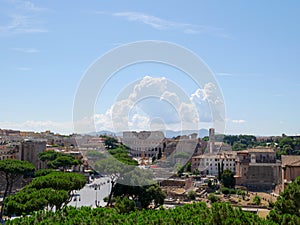 Beautiful clouds above coliseum, view of the Colosseum and the Roman Forum, Rome, Italy.