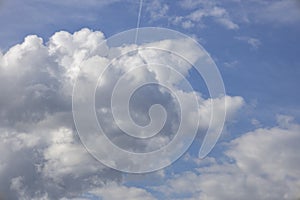 A beautiful clouds against the blue sky background. Clouds in the sky. Beautiful natural pattern in the sky