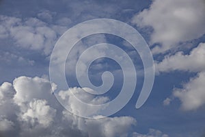 A beautiful clouds against the blue sky background. Clouds in the sky. Beautiful natural pattern in the sky