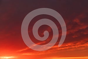 Beautiful clouds at sunset. Dramatic sky in sun. Natural background.
