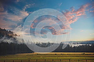 Beautiful Clouds Sunset Over Green Countryside Pasture