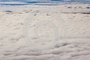 Beautiful cloudscape and blue sky from aerial view, nature view from above the sky and clouds. White clouds and blue sky view like