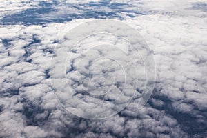 Beautiful cloudscape and blue sky from aerial view, nature view from above the sky and clouds. White clouds and blue sky view like