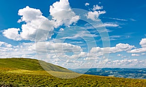 Beautiful cloudscape over the mountain meadow