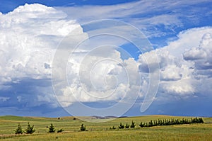 Beautiful cloudscape over rolling green hills