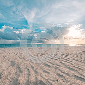 Beautiful cloudscape over the sea, sunrise horizon sand waves. Idyllic inspirational beach landscape