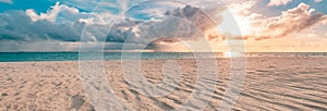 Beautiful cloudscape over the sea, sunrise horizon sand waves. Idyllic inspirational beach landscape