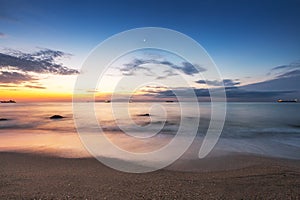 Beautiful cloudscape over the sea at sunrise