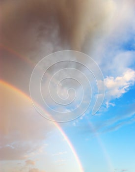 Beautiful cloudscape with rainbow