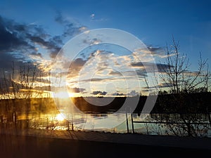 Beautiful cloudscape. Sunset landscape with forest.