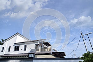 Beautiful cloudy day scene at the concrete houses.