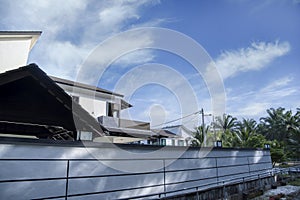 Beautiful cloudy day scene at the concrete houses.