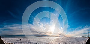 Beautiful cloudy sky panorama over ice photo