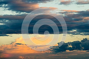 Beautiful cloudy sky with sun rays. Cloudy abstract background. Sunset light.