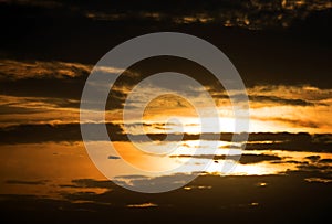 Beautiful cloudy sunset seen from the hills of Siria, Romania.