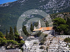 The beautiful coast of Montenegro near Budva Riviera - the view from the sea to the beaches and towns is an unforgettable experien