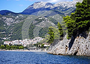 The beautiful coast of Montenegro near Budva Riviera - the view from the sea to the beaches and towns is an unforgettable experien