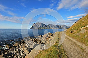 Beautiful coast near Uttakleiv, with mountains in the background, Lofoten Islands, Norway, Europe