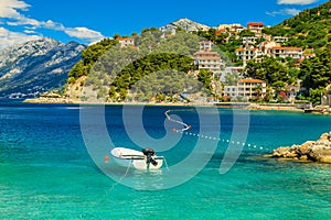 Beautiful coastline and beach with motorboat,Brela,Dalmatia region,Croatia,Europe