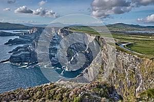 Beautiful coastline at the Ring of Kerry, Ireland. Huge cliffs at the Ring of Kerry Ireland. View on the Skellig Islands