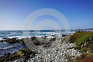 Beautiful coastline scenery with ocean waves and rocks on Pacific Coast