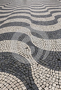 Beautiful Cobblestone pavement forming waves in Lisbon