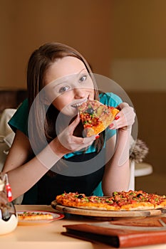 Beautiful college student in pizzeria