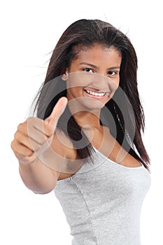 Beautiful colombian teenager girl gesturing thumb up photo