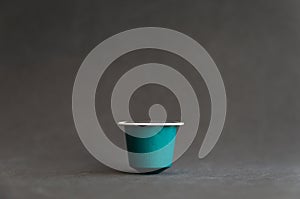 Beautiful colored coffee capsule on black background