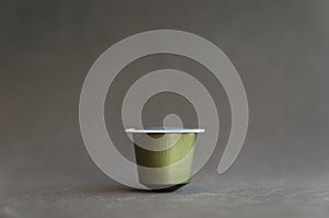 Beautiful colored coffee capsule on black background