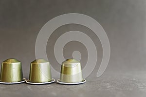 Beautiful colored coffee capsules on black background